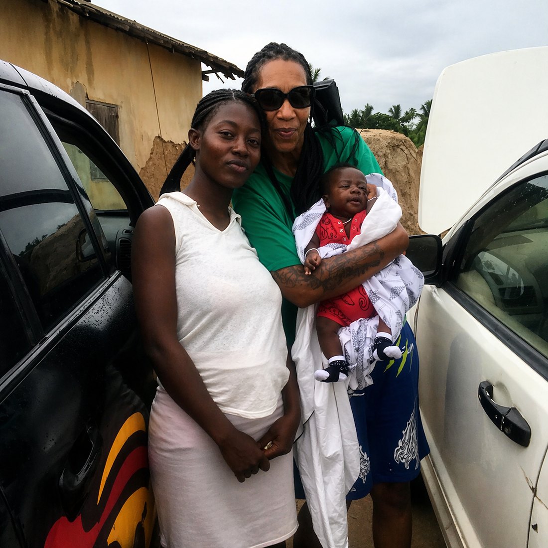 Chief Myra with a mother and child in the village